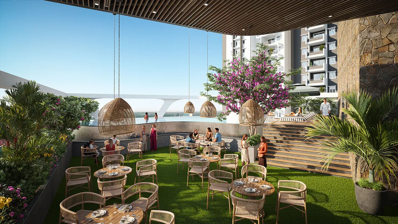 Anvita Ivana rooftop dining and lounge terrace with pool view, Kollur
