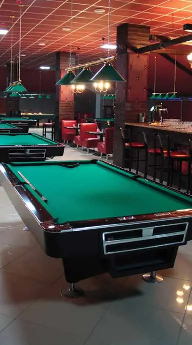 Billiards tables, representative image of the billiards lounge amenity at Vaishnavi Houdini