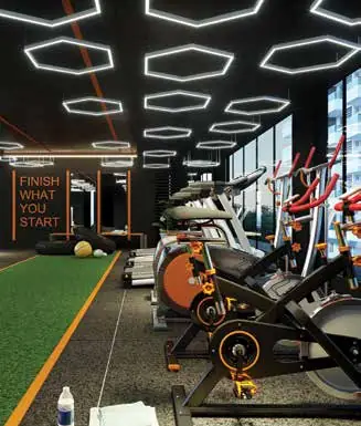 Gymnasium with cardio machines in the Vaishnavi Houdini clubhouse, Bandlaguda Jagir