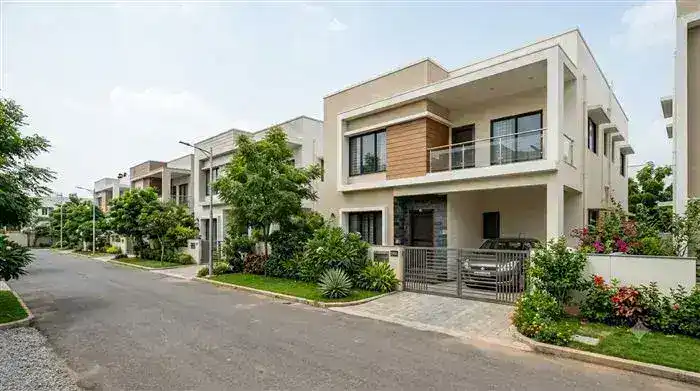 Villa entrance with private garden and driveway in Hyderabad